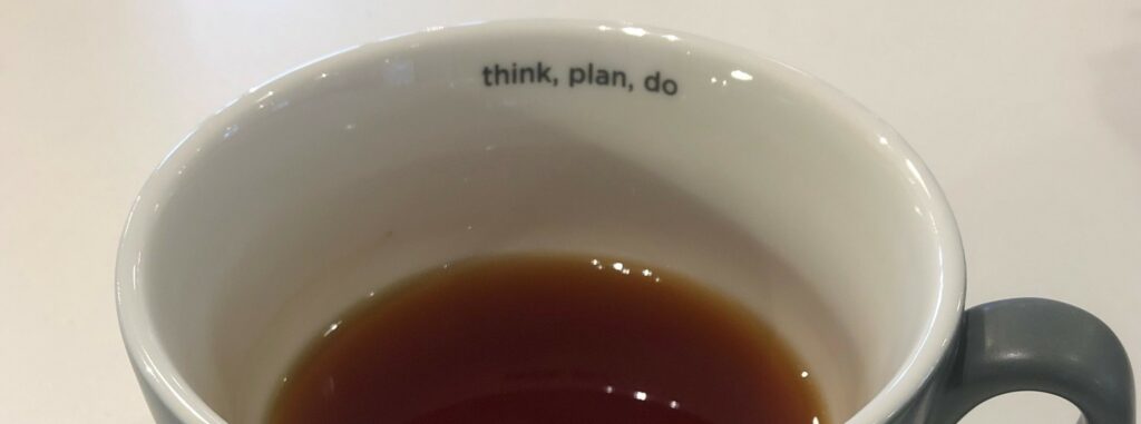 Half empty think plan do cup